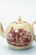 Teapot with commedia dell'arte decor